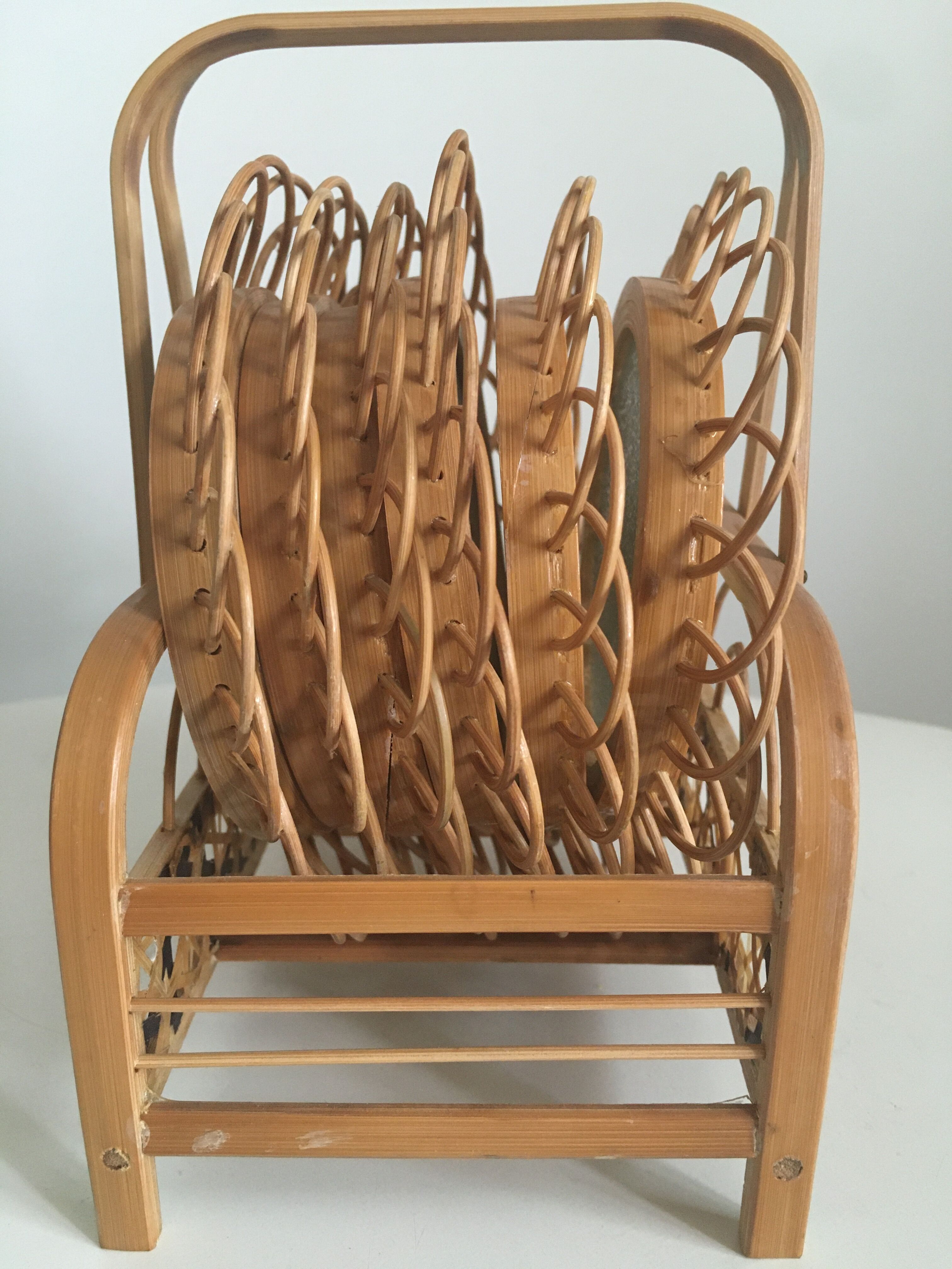 Rattan under glasses with butterflies in bamboo display