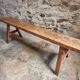 Rustic old wooden bench – early 20th century – seat in solid pine and base in chestnut.