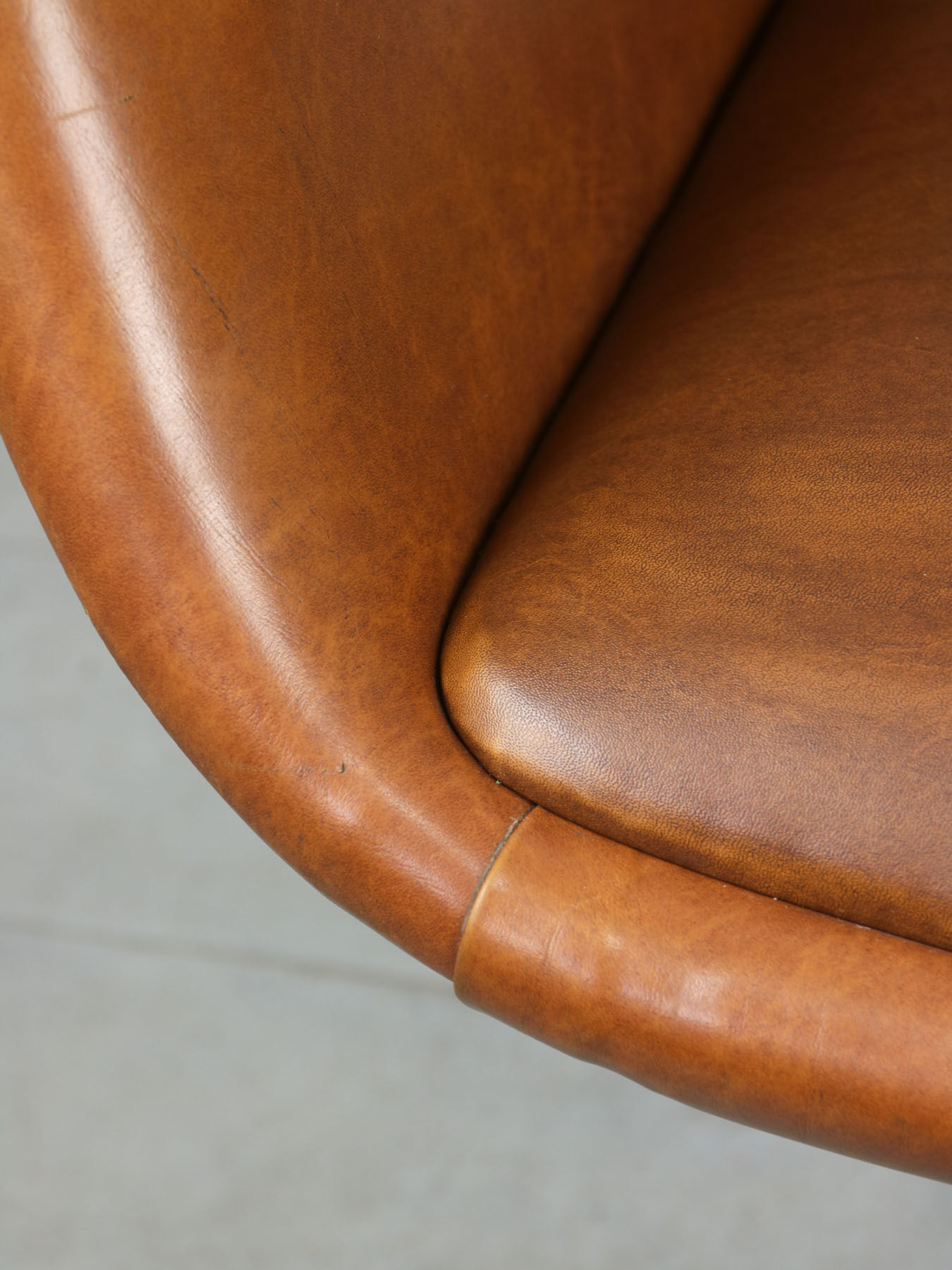 Mid-century brown leatherette swivel chair from Stol