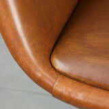 Mid-century brown leatherette swivel chair from Stol
