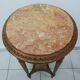 Wooden pedestal table carved in the Louis XVI style