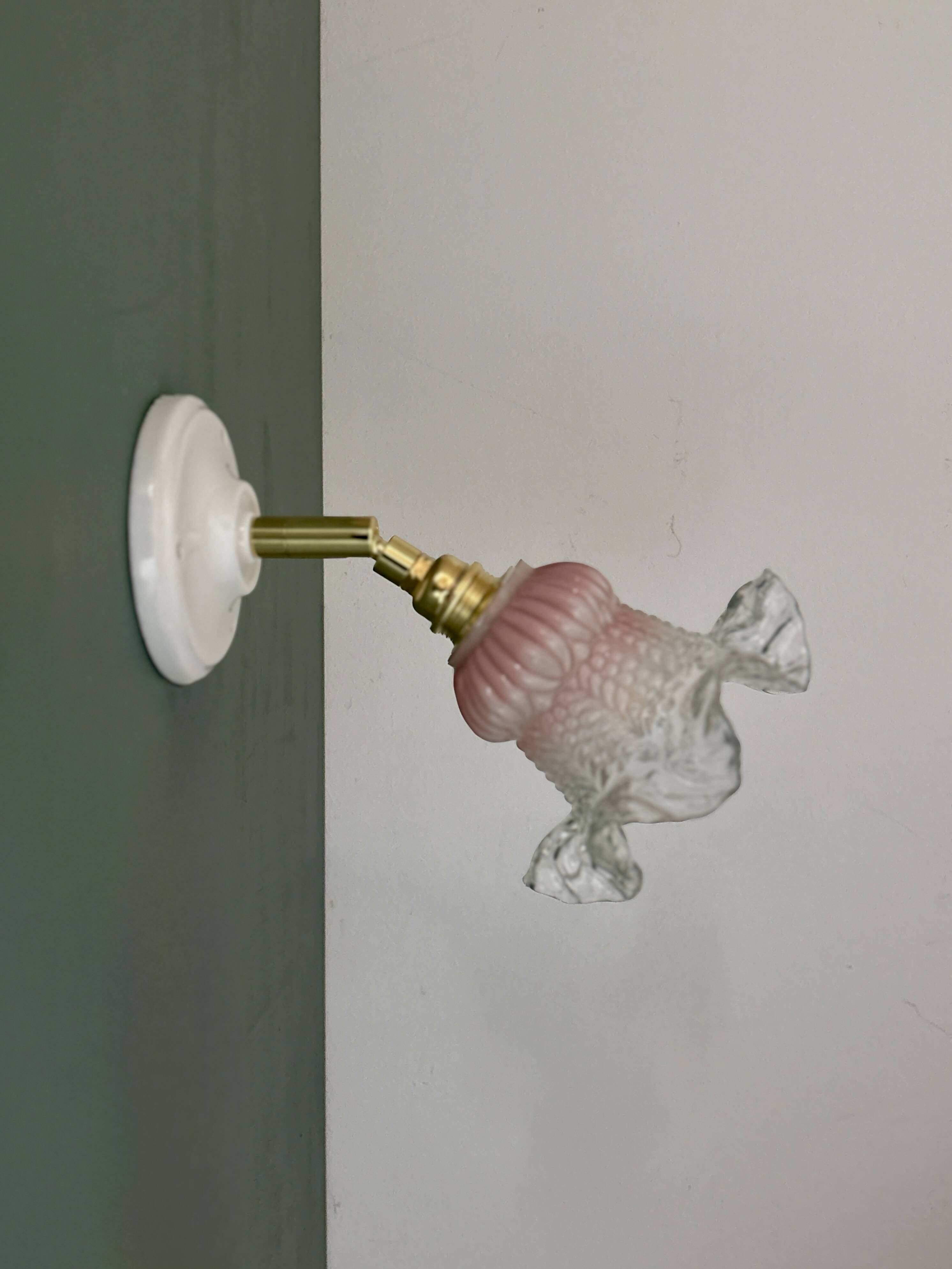 Vintage pink and clear glass tulip wall light.