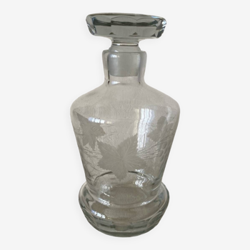 Small cut blown glass carafe with engraved decoration of vine leaves and grapes threaded cap