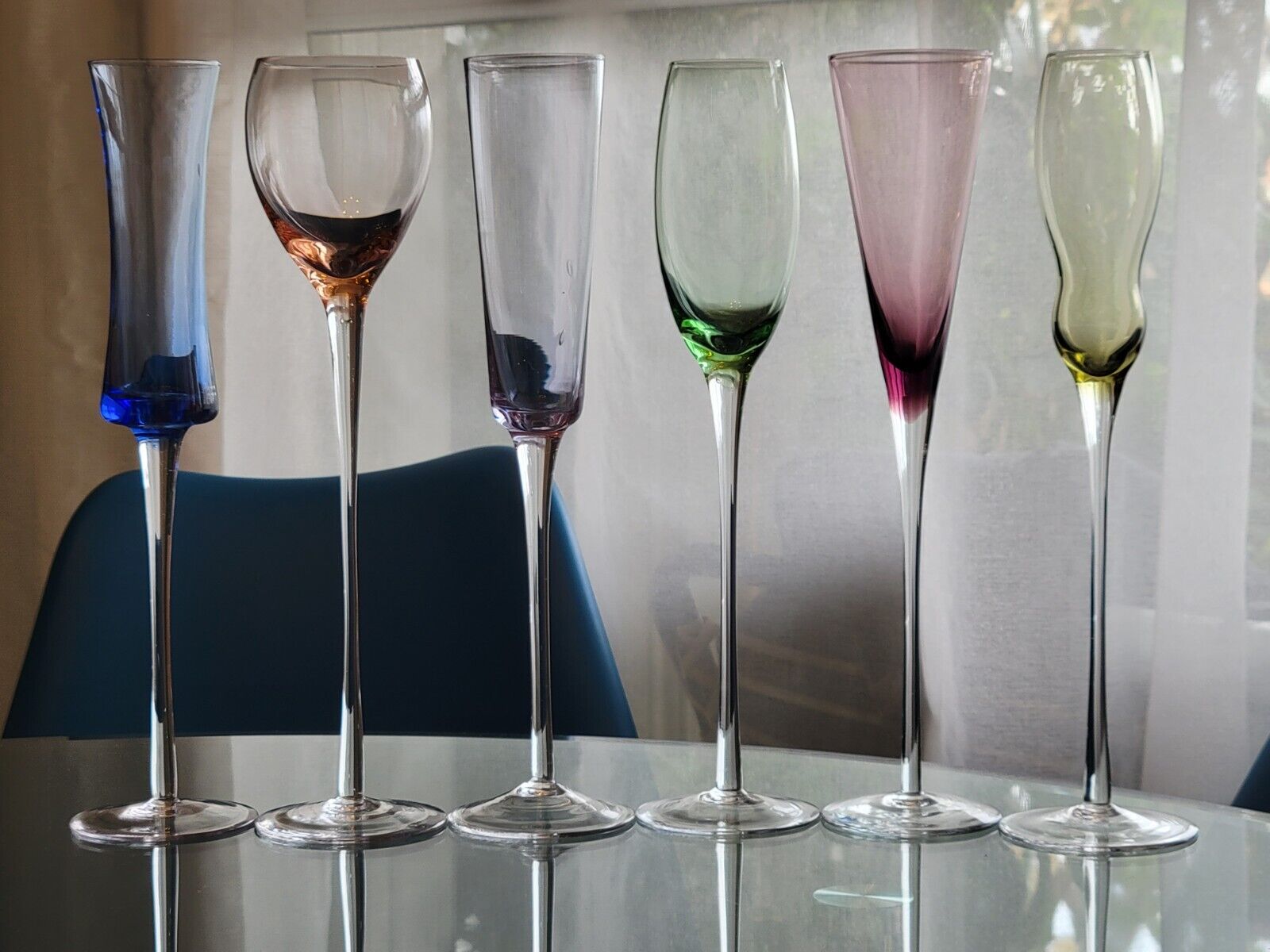 Set of 6 champagne flutes in different colors and shapes