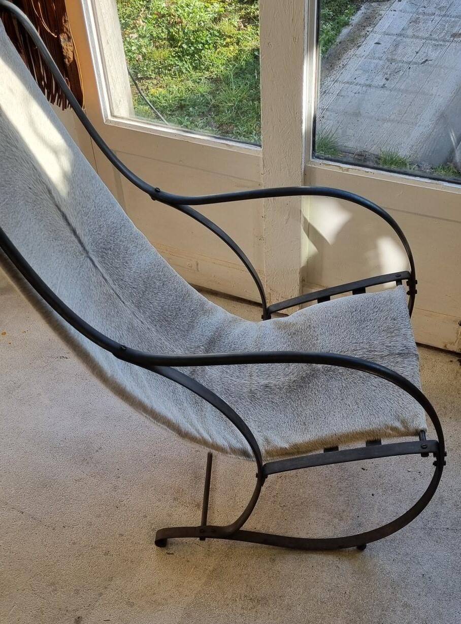 Wrought iron and skin armchair