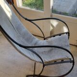 Fauteuil en fer forge et peau