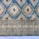 Tapis oriental fait main xxeme fond bleu 307 cm x 222 cm