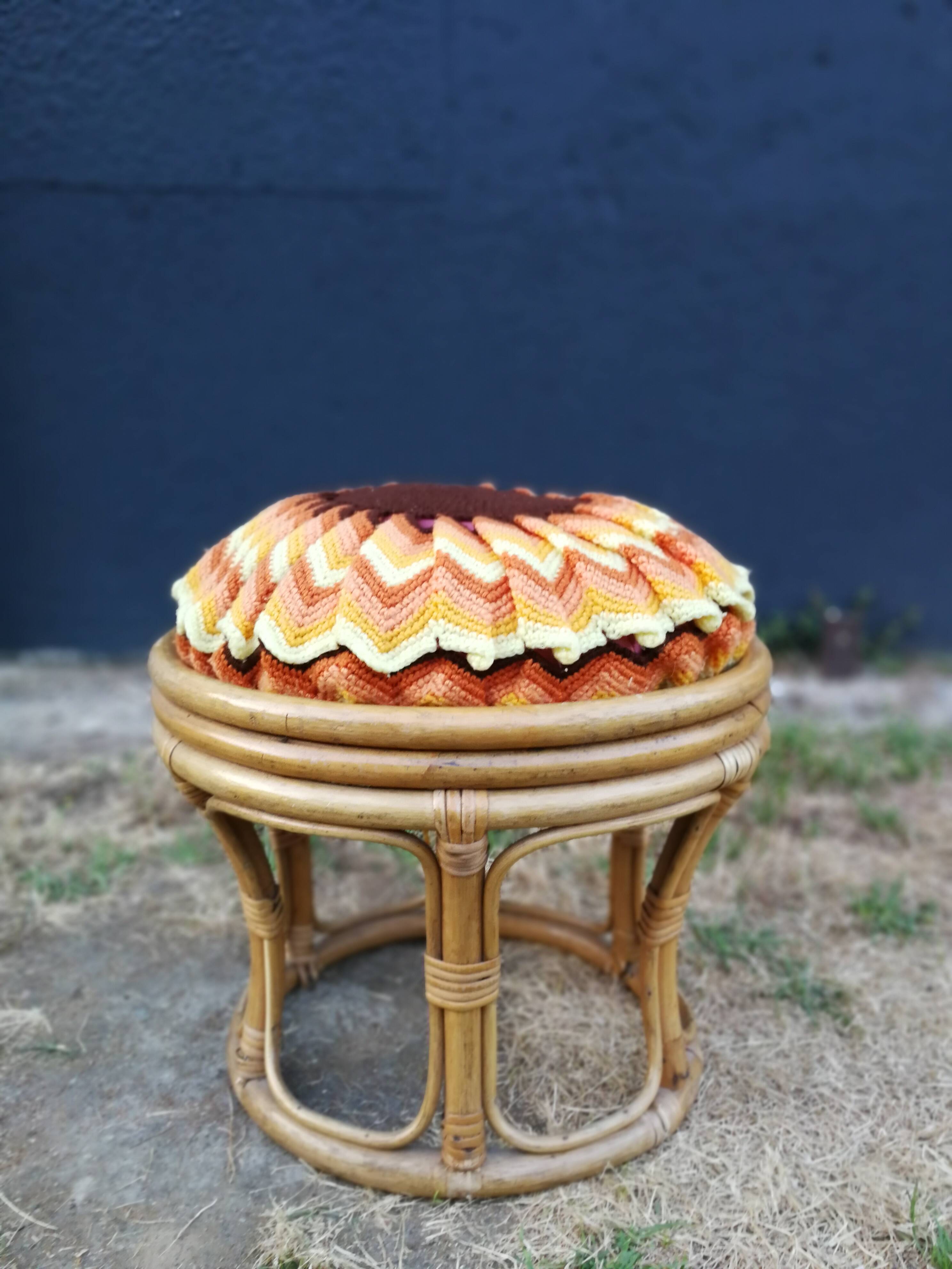 Rattan pouf and its 70's cushion