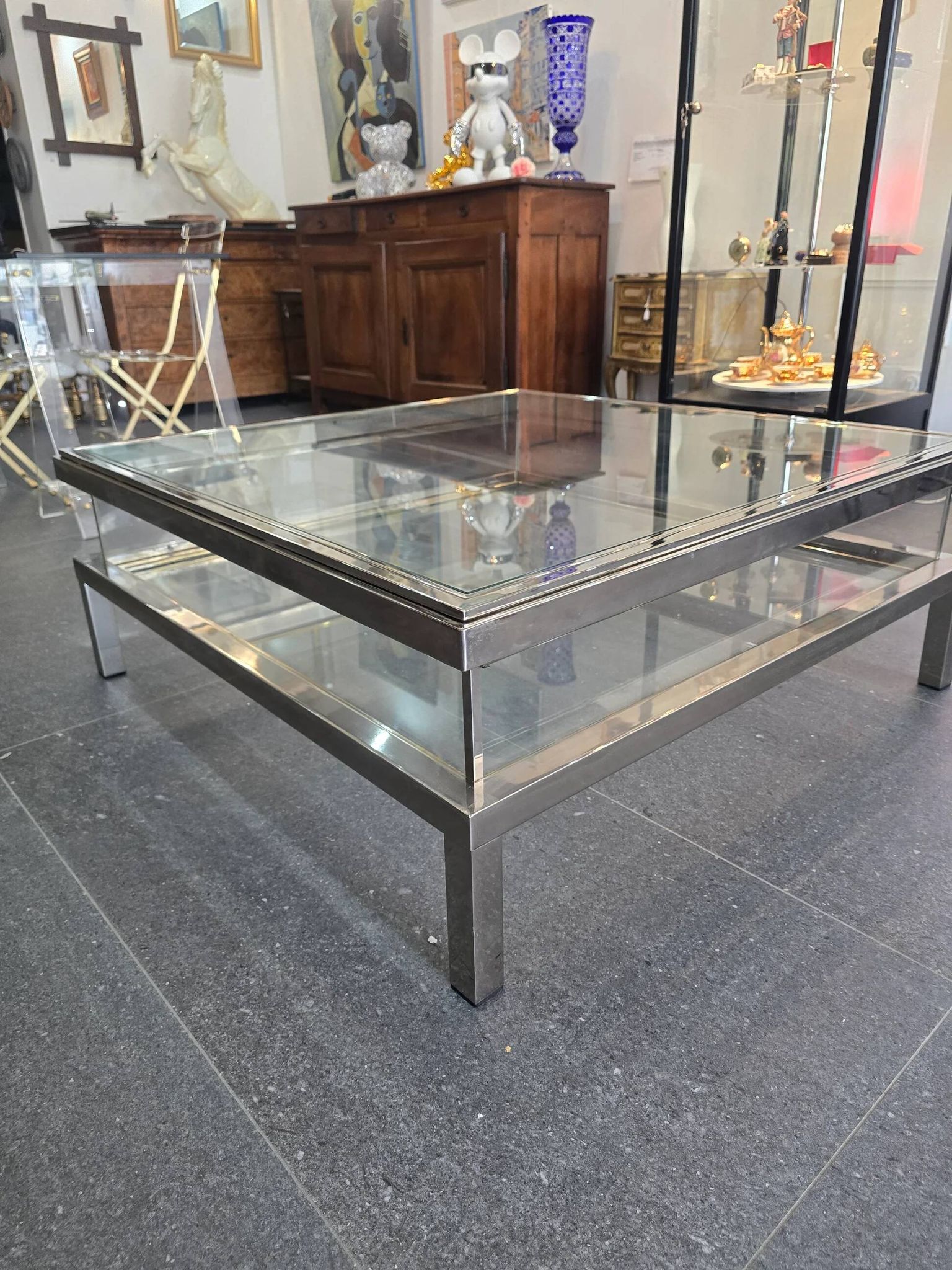 Sliding top coffee table – 70s design – chrome & glass – 108 cm