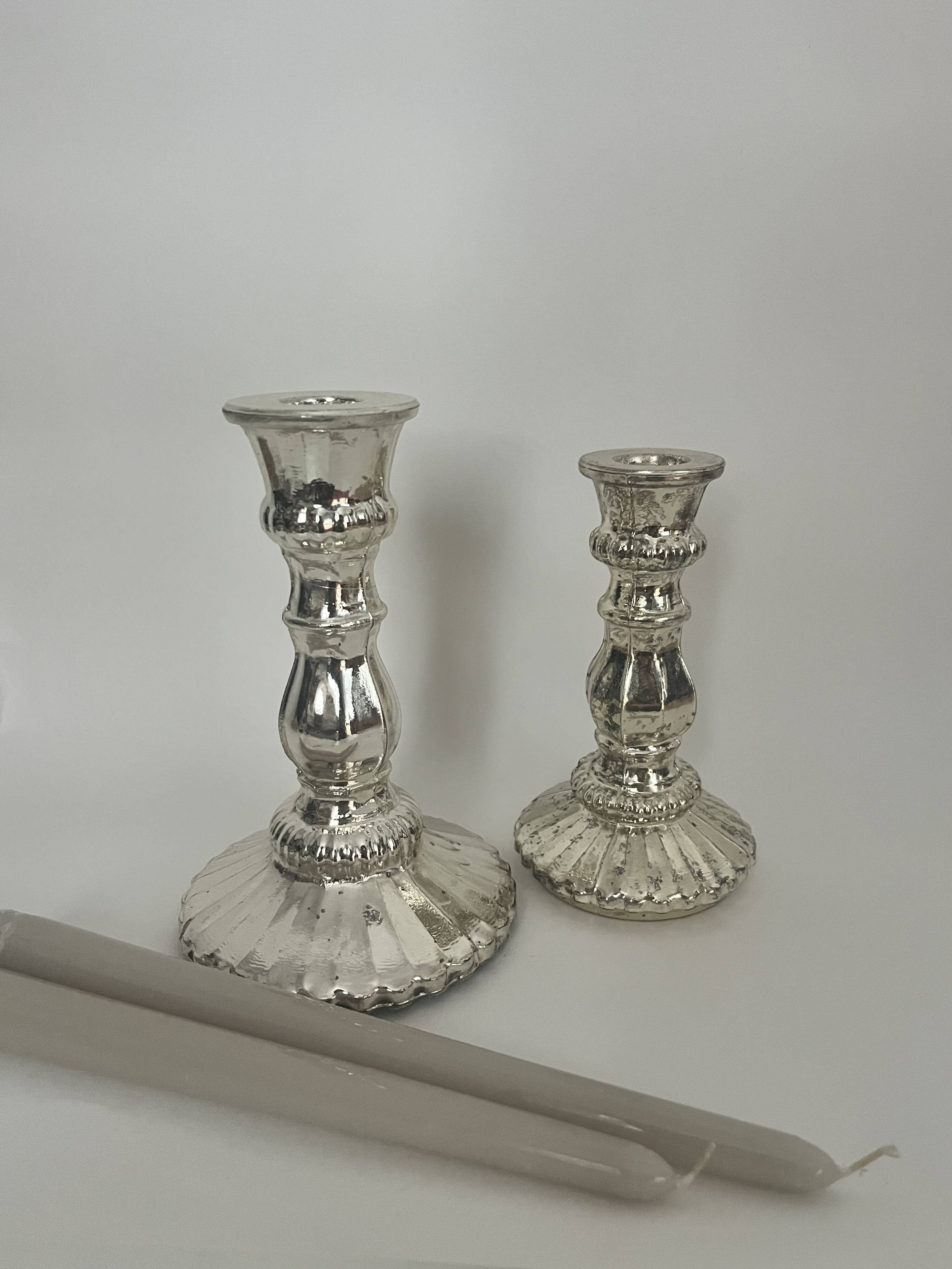 Pair of eglomisé glass candle holders, party decoration