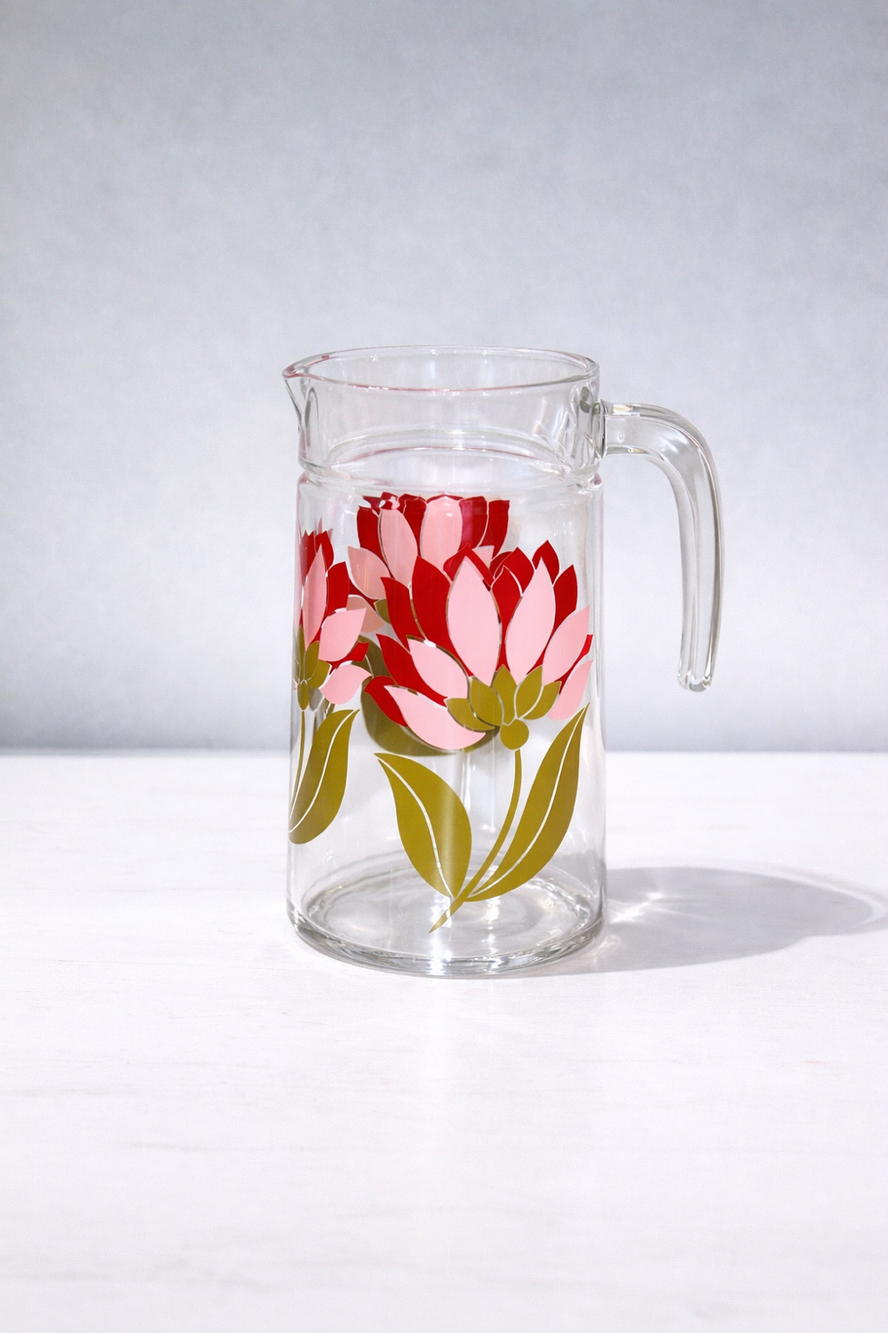 Vintage glass jug / carafe with magnolia decoration - 1970s