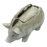 Vintage mustard pot in porcelain shaped like a pig.