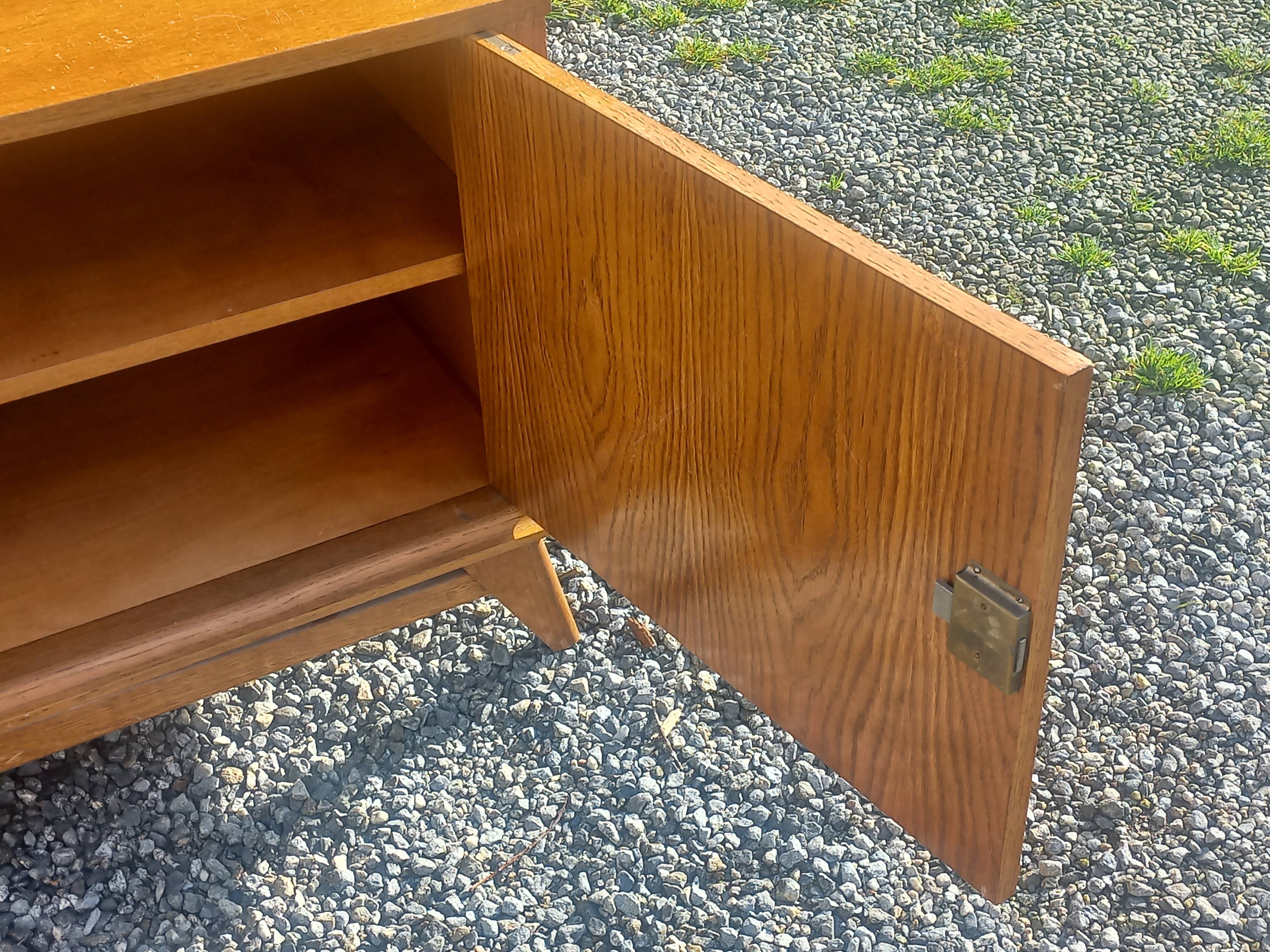 Vintage oak sideboard with splayed legs from the 1950s.
