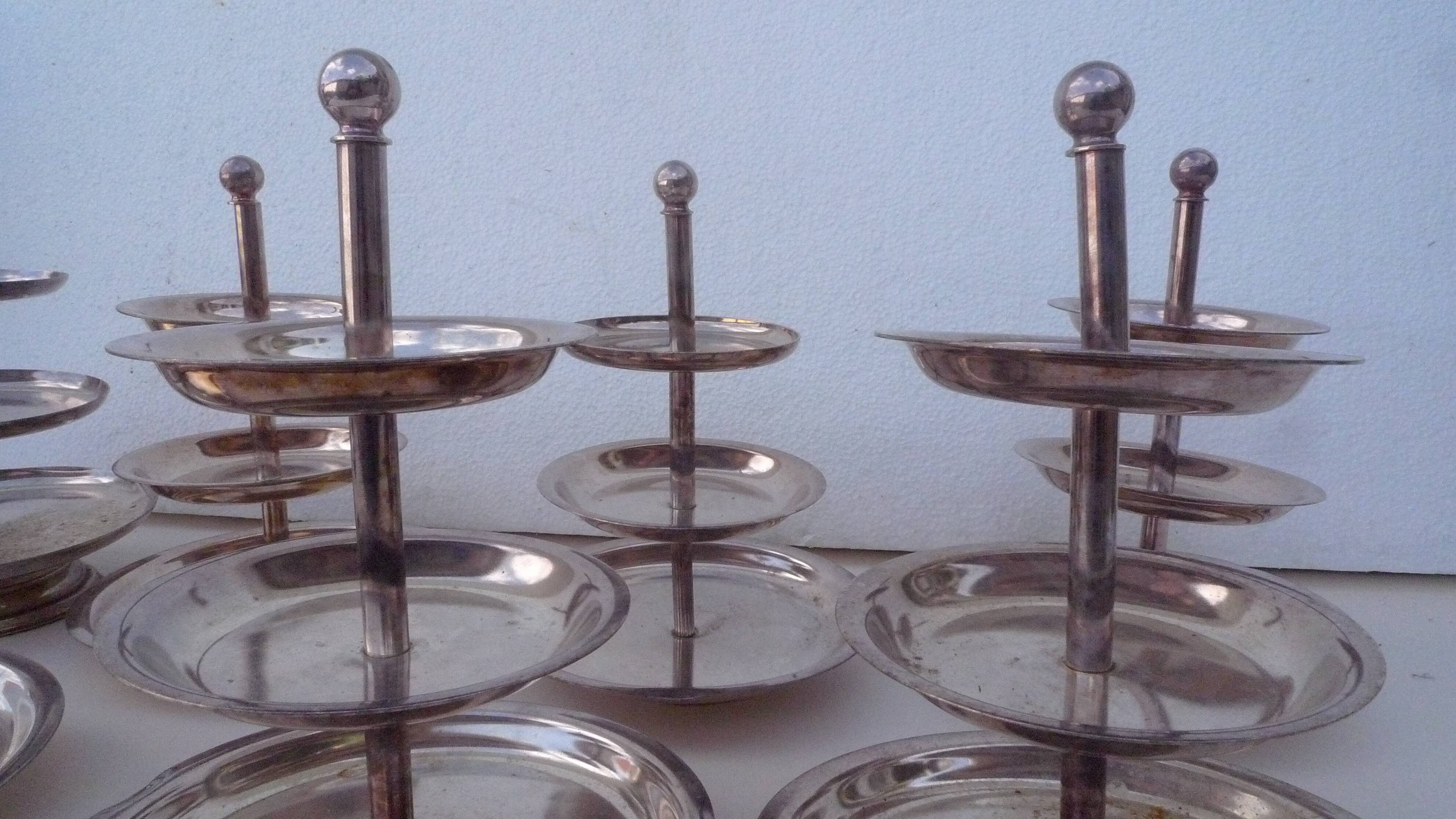 Set of 10 three-tiered serving trays.