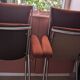 Pair of vintage folding chairs in terracotta fabric.