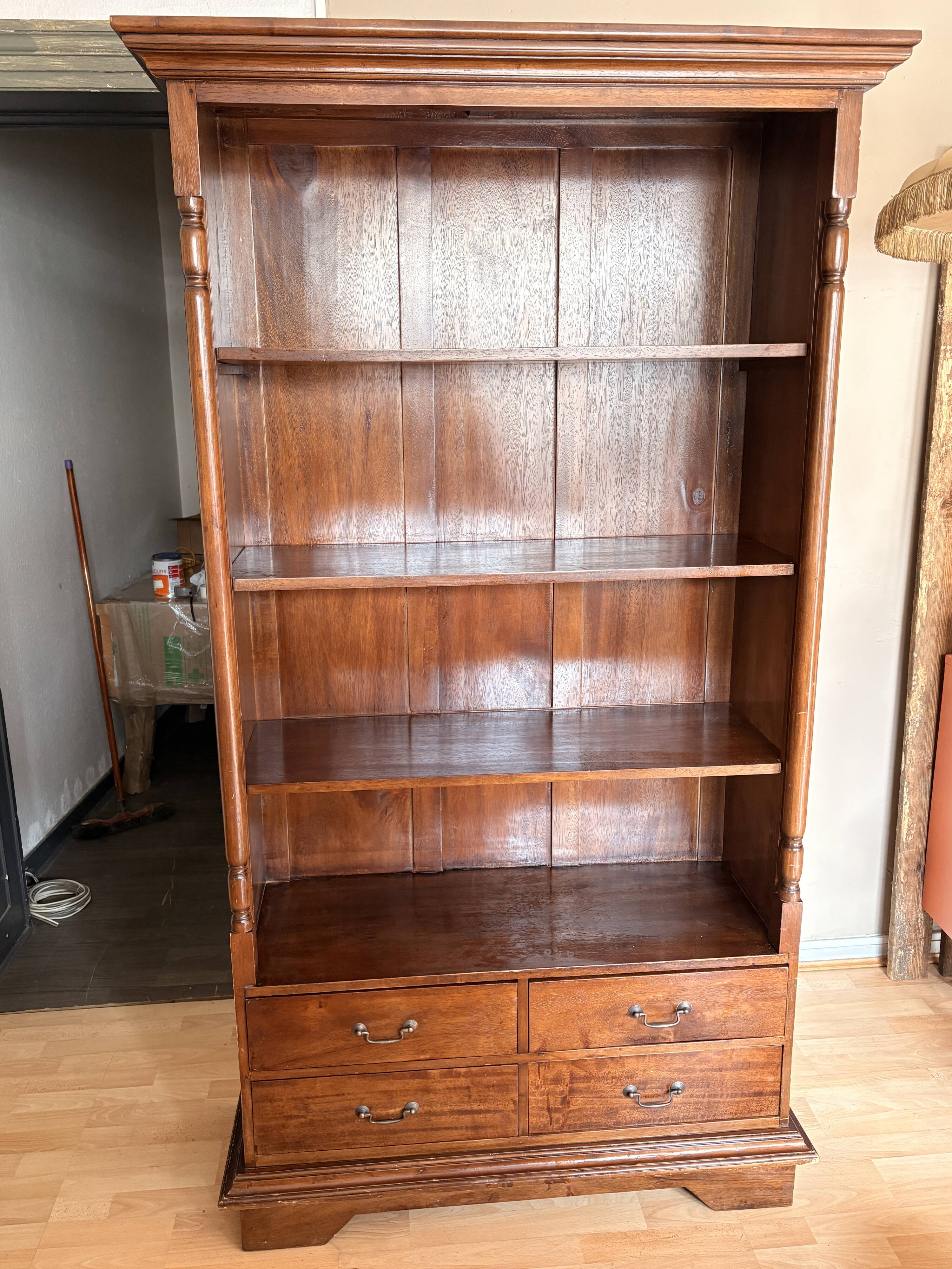 Wooden bookshelf with drawer