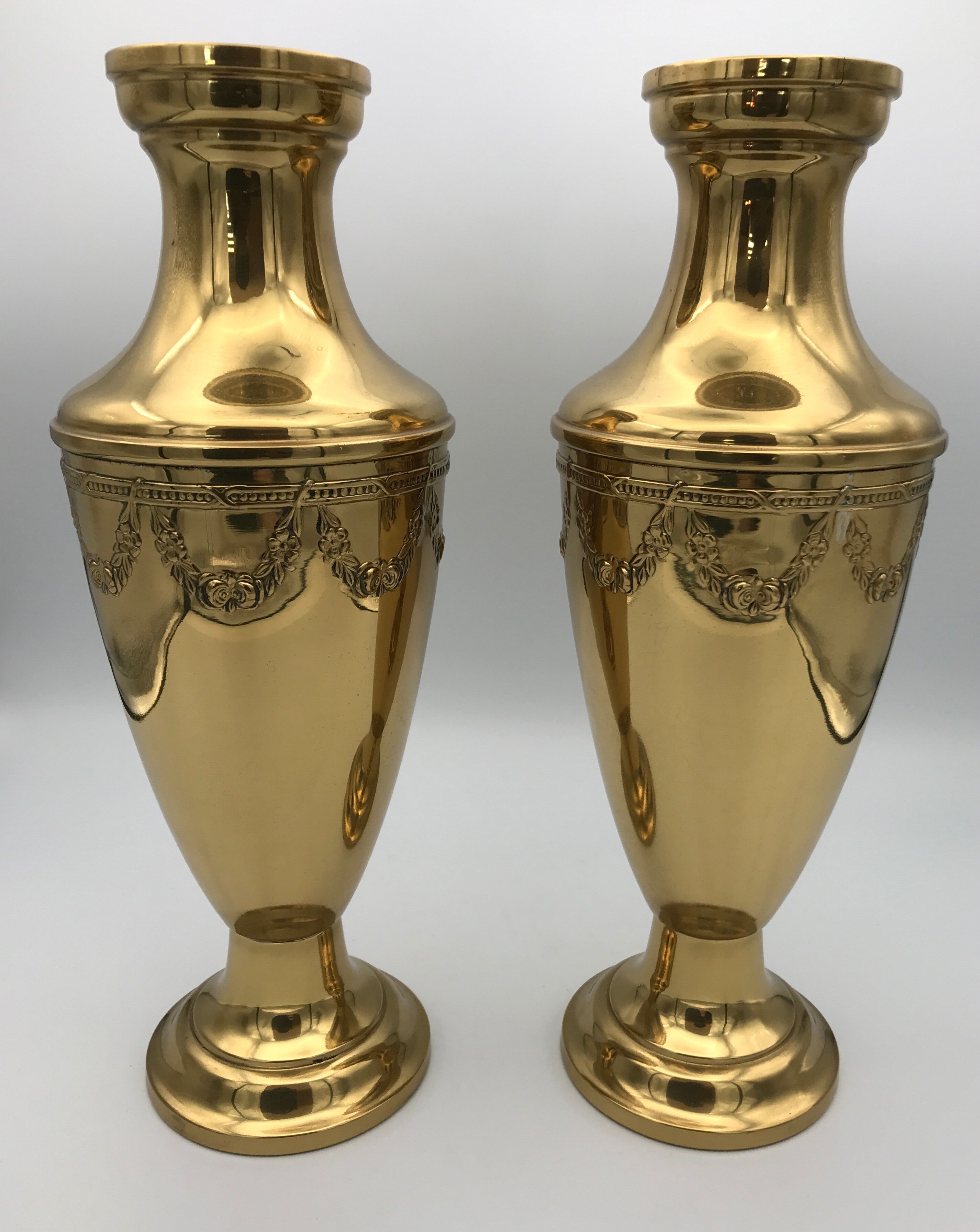 Pair of golden brass vases with floral frieze pattern 27.5 cm