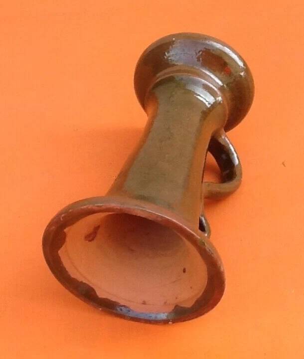 Varnished terracotta spool candlestick