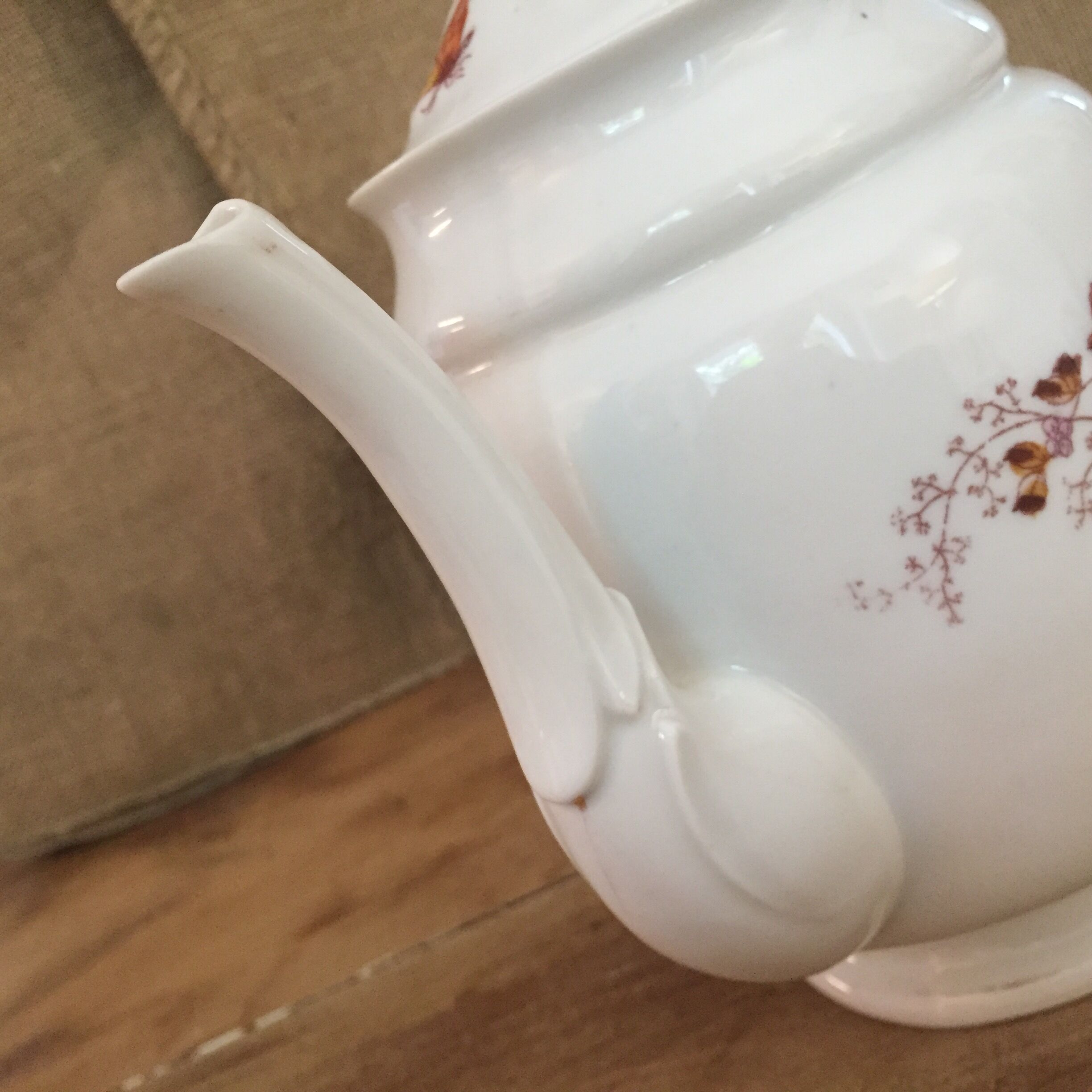 Teapot and its vintage porcelain milk jar