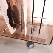 Vintage hifi, LP cabinet, TV unit made of tinted plexiglass on wheels, records.