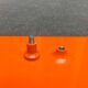 Orange coat rack from the mid-century space age, 1960s.