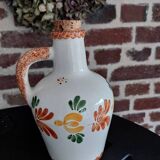 Old earthenware brandy bottle