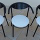 6 gondola-style chairs with a metal structure for indoor and outdoor use.