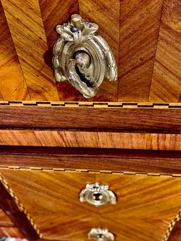 Transition style chest of drawers in rosewood and violet wood, ebony and gilded bronzes