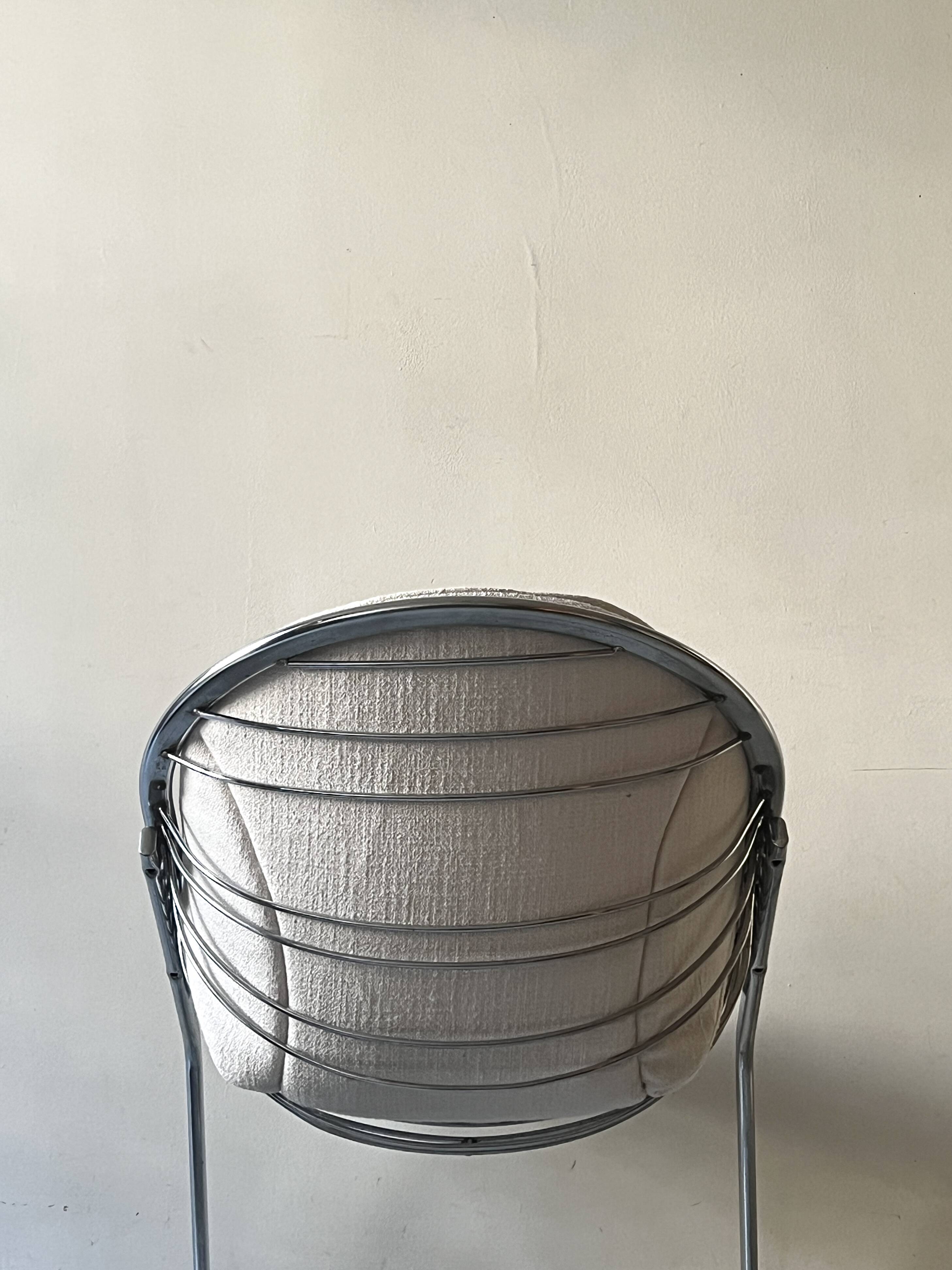 Chromed metal Egg armchair by Gastone Rinaldi, 1970s design chair.