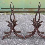 pair of andirons attributed to Raymond Subes, flame model