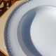 Twelve white porcelain plates