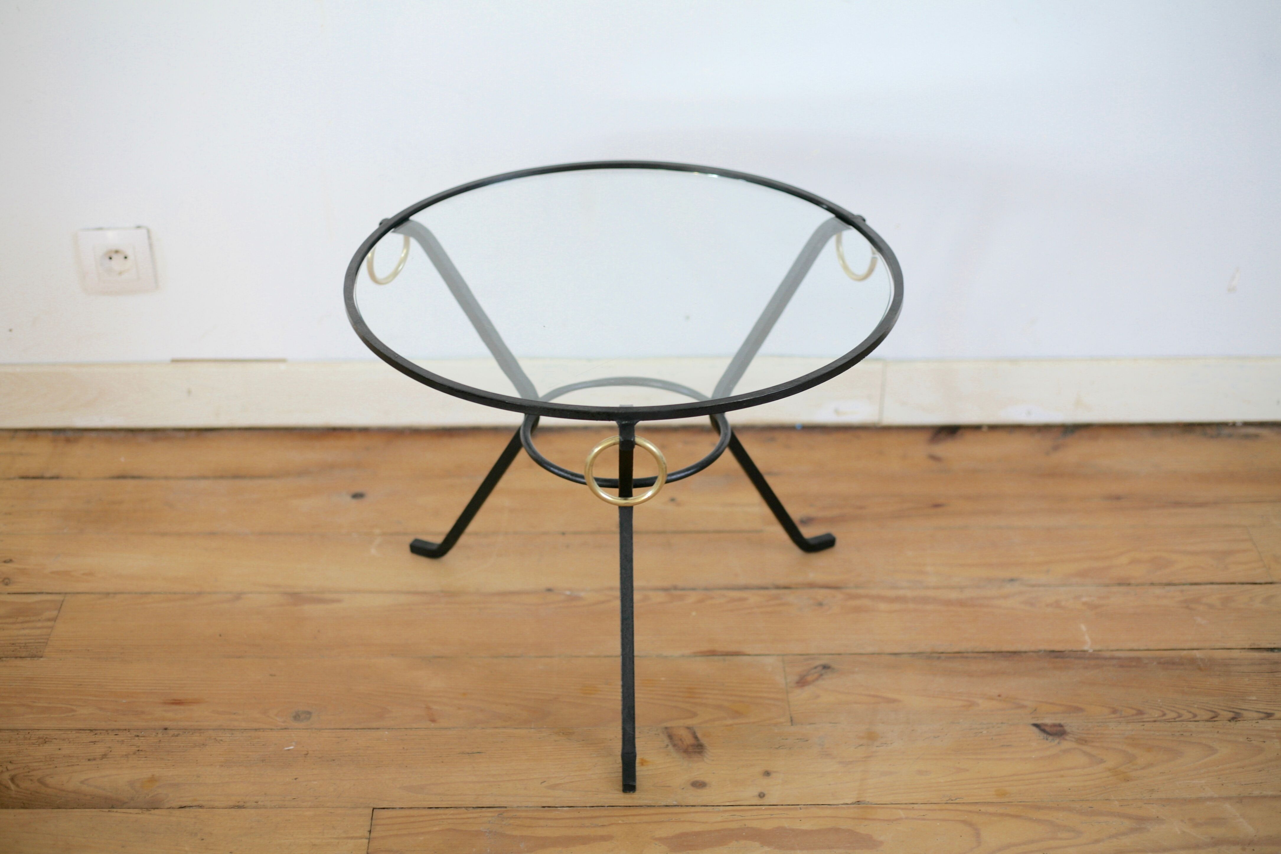 Coffee table black lacquered metal, glass and brass, France, circa 1950.