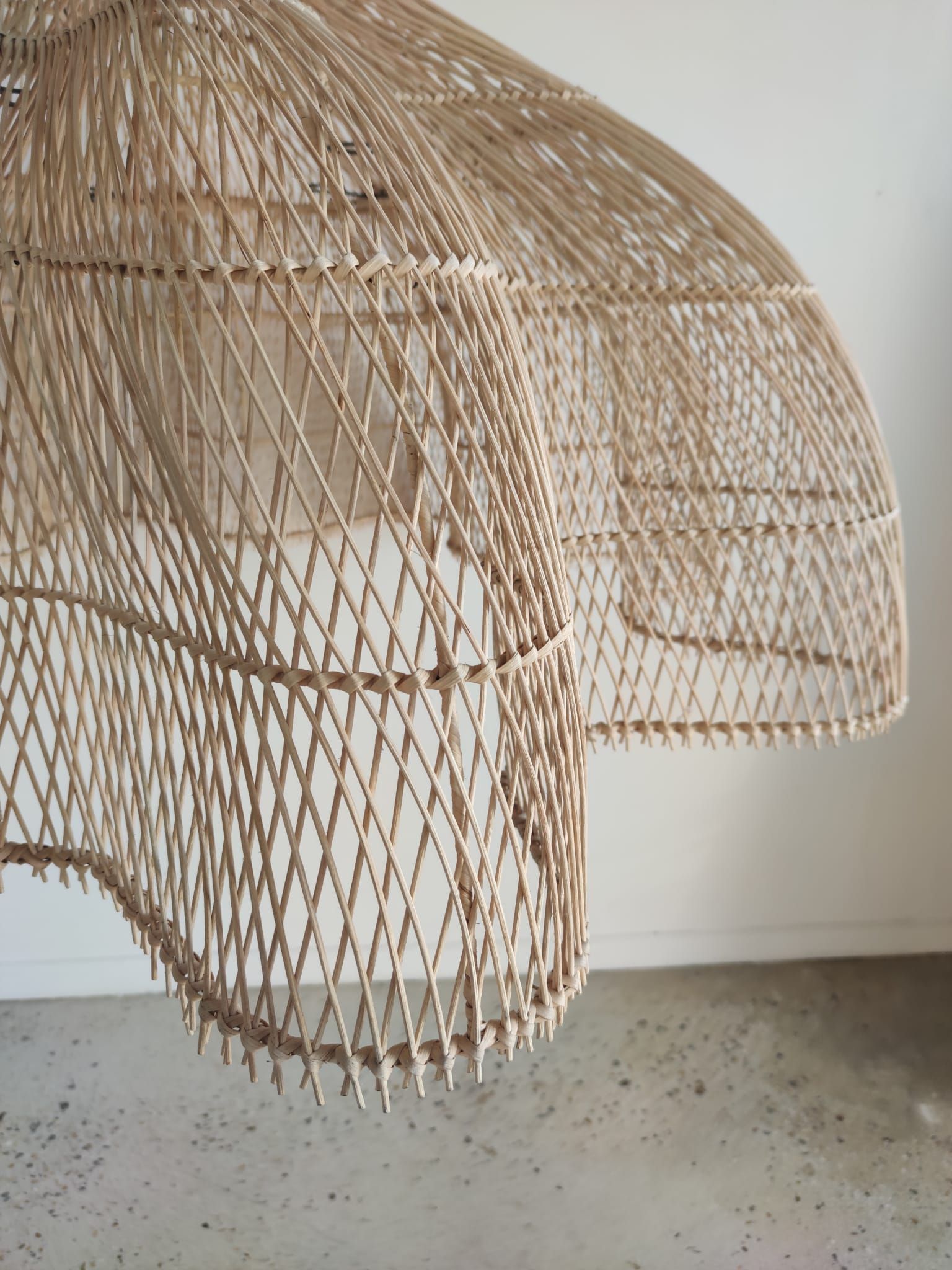 Huge rattan suspension in the shape of a corolla H:1m; D: 1m50