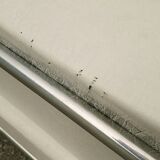 Chrome-designed chair and faux white leather 1970