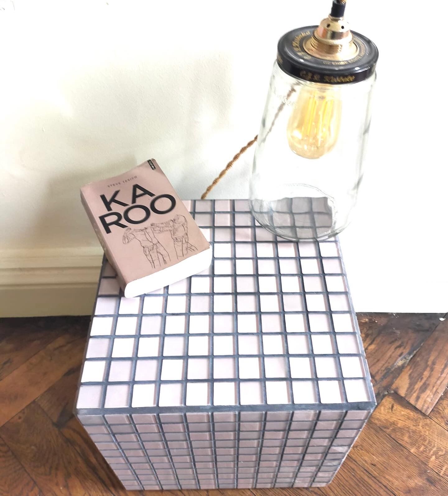 Ceramic tile cube, stool end of sofa
