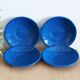 Set of 4 blue enamelled metal plates