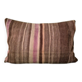 Cushion cover in an old Berber blanket.