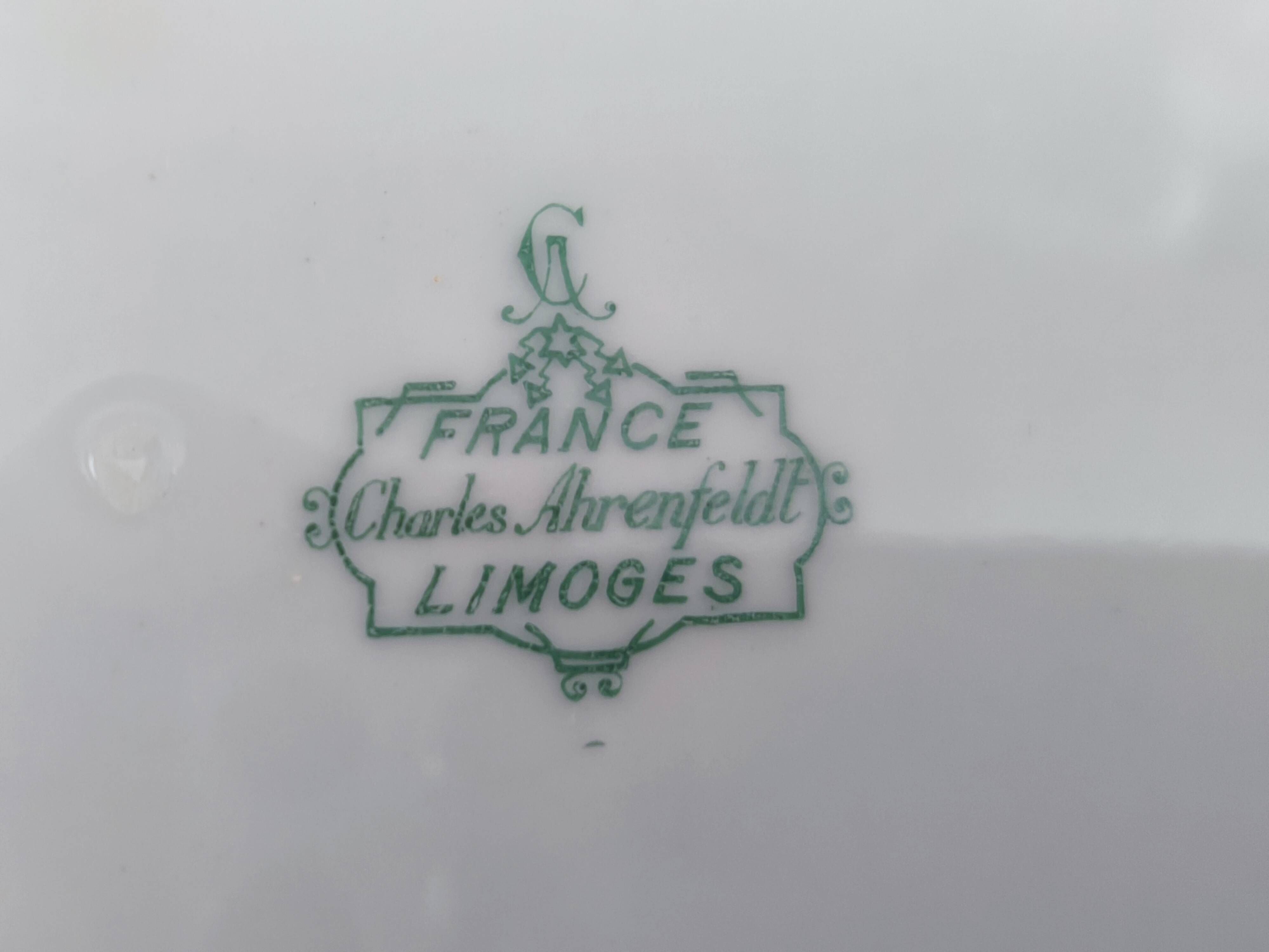 Set of 7 Limoges porcelain dinner plates from Maison Charles Ahrenfeldt