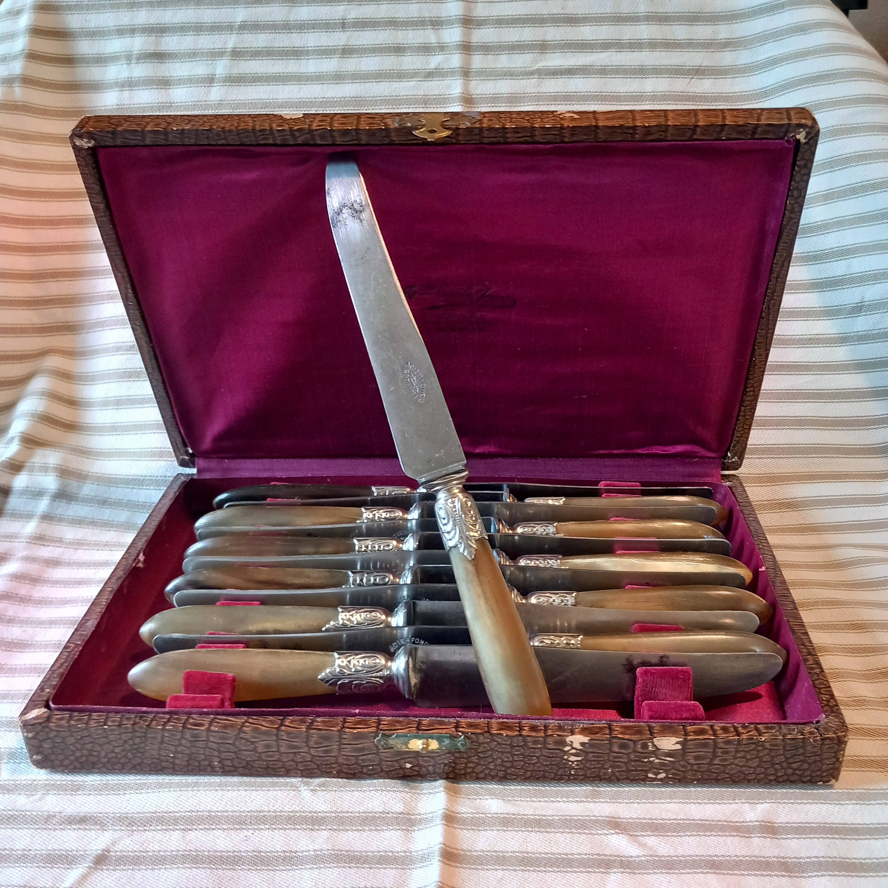 Box of 12 old cast steel knives