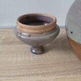 Lidded sandstone carafe