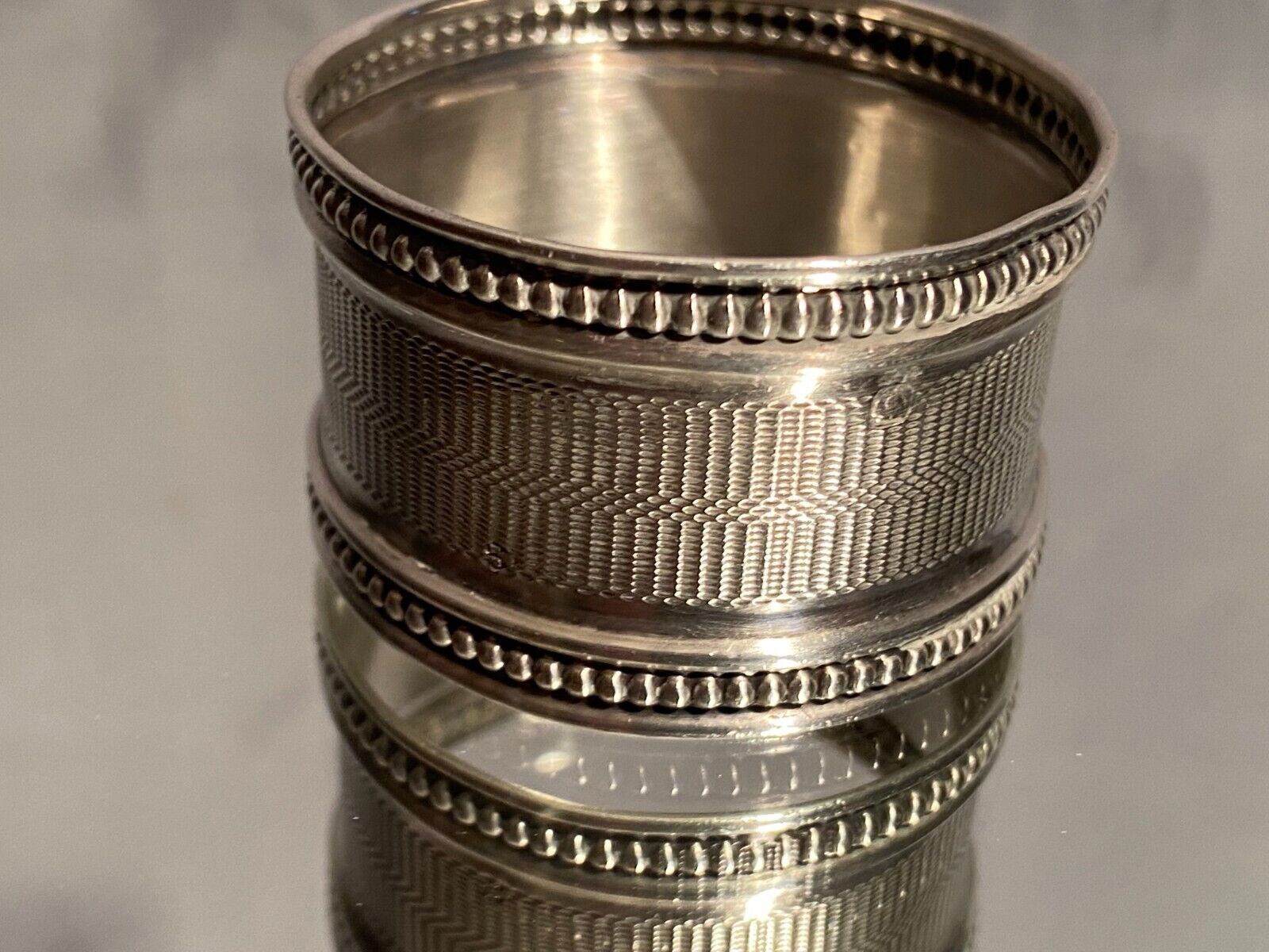 Solid silver napkin ring Minerva with Louis XVI style guilloché decoration