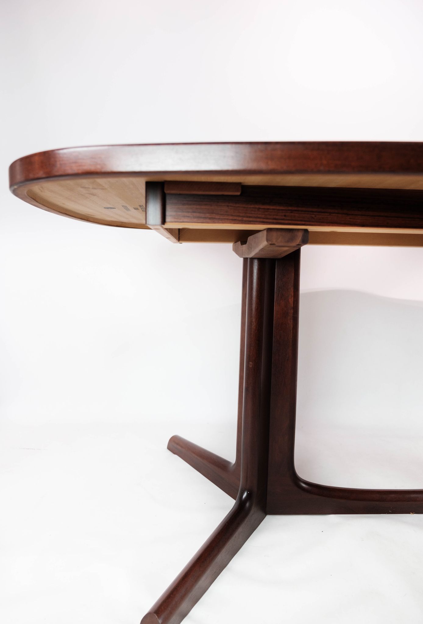 Dining table in rosewood with extensions of Danish design by Gudme Furniture, 1960s