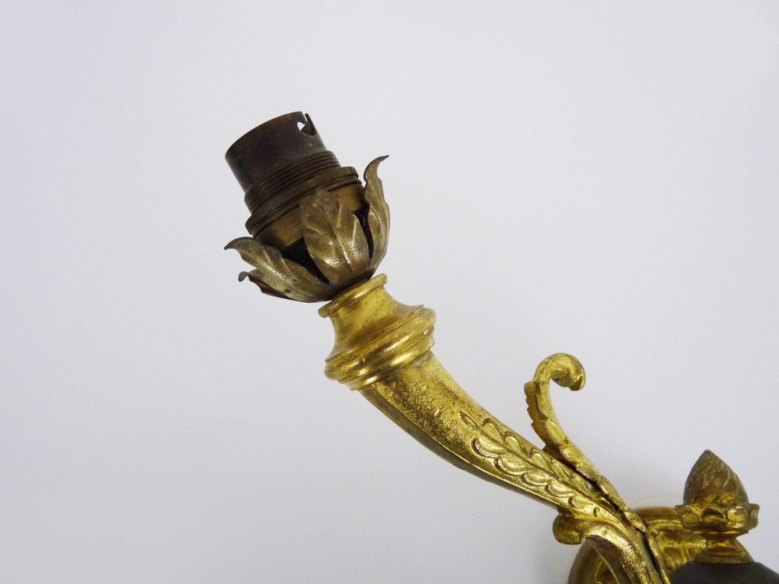 Pair of double-light Empire style wall lights in bronze