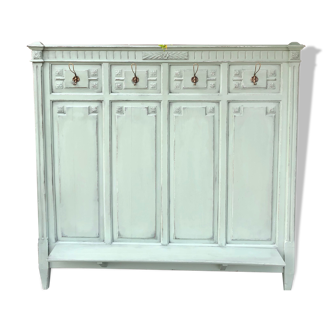 Cloakroom with sage green wall coats