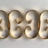 Pair of under-bottles volutes gold metal