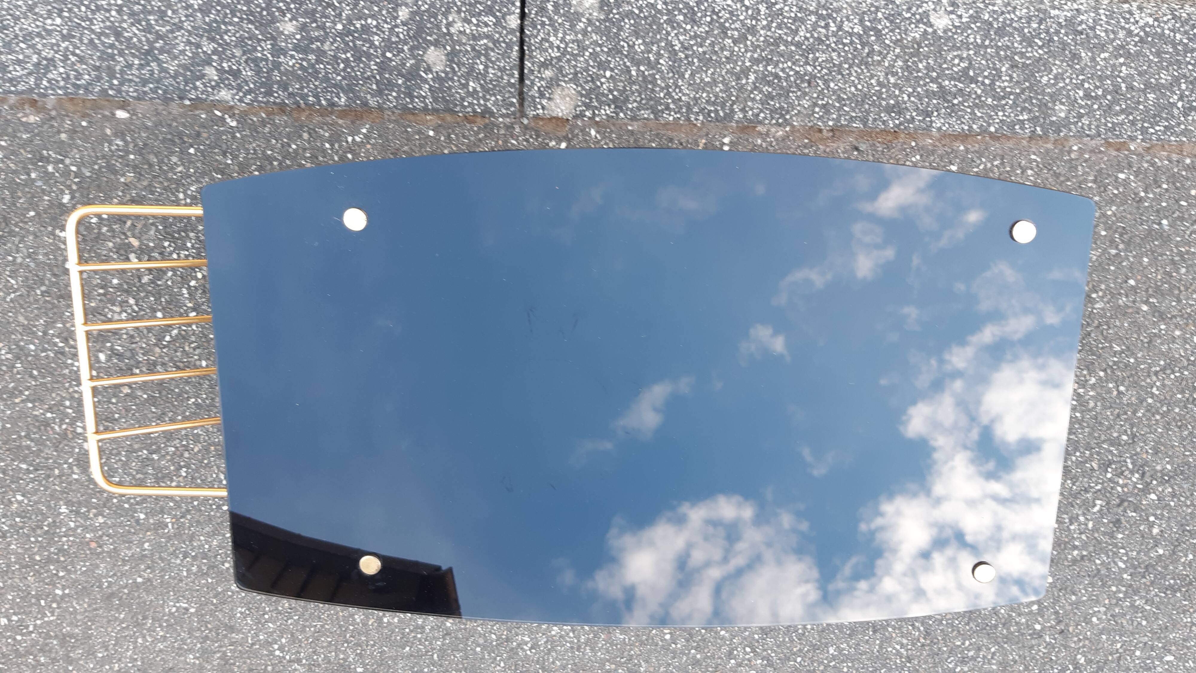 End of sofa black glass and brass 1970