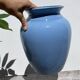 Minimalist plain blue ceramic baluster vase