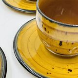 Set of four vintage Boch Palma cups and saucers.