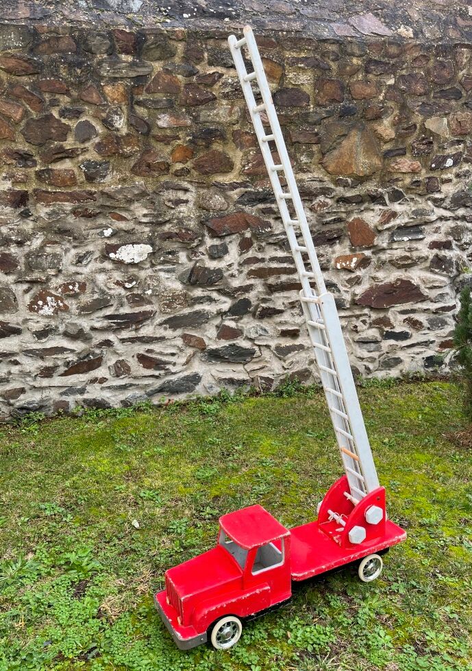 Fire truck with wooden ladder