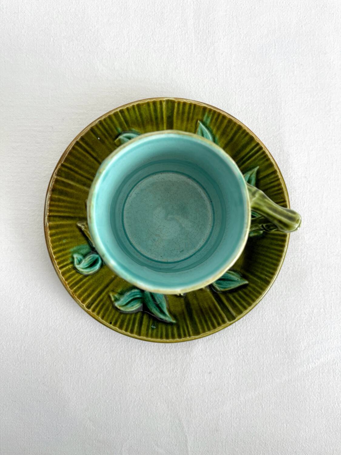 Antique earthenware coffee cup in bamboo slip